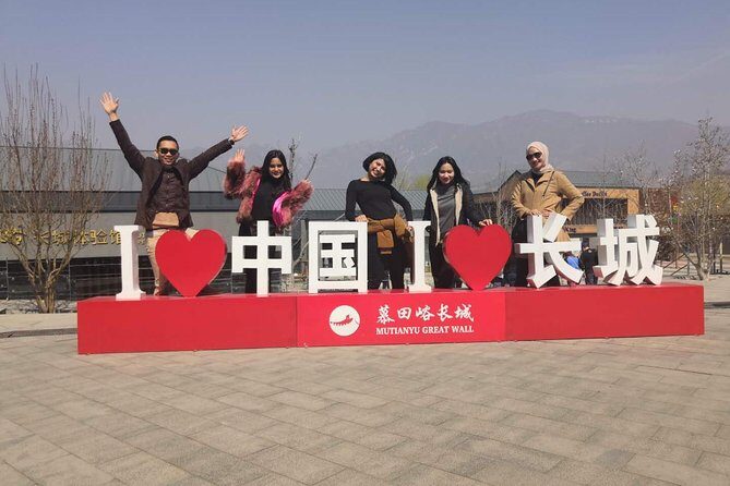Private Mutianyu Great Wall Trip with English-Speaking Driver - Entering the Wall: Ticketing help and the shuttle bus step