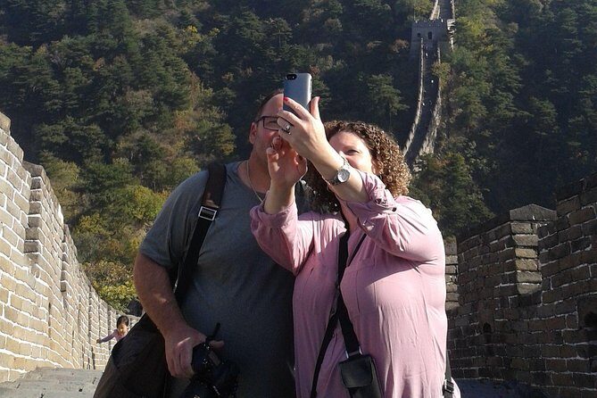 Private Round Trip Transfer Service To Mutianyu Great Wall - The Great Wall walking portion: 5 km, 23 towers, and the views you came for
